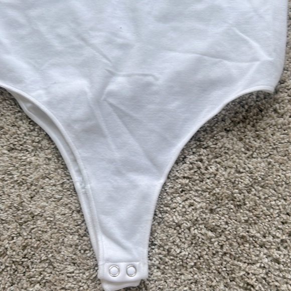 Up for sale is this M/L white body suit, perchase Sugar Rain. - Picture 3 of 3